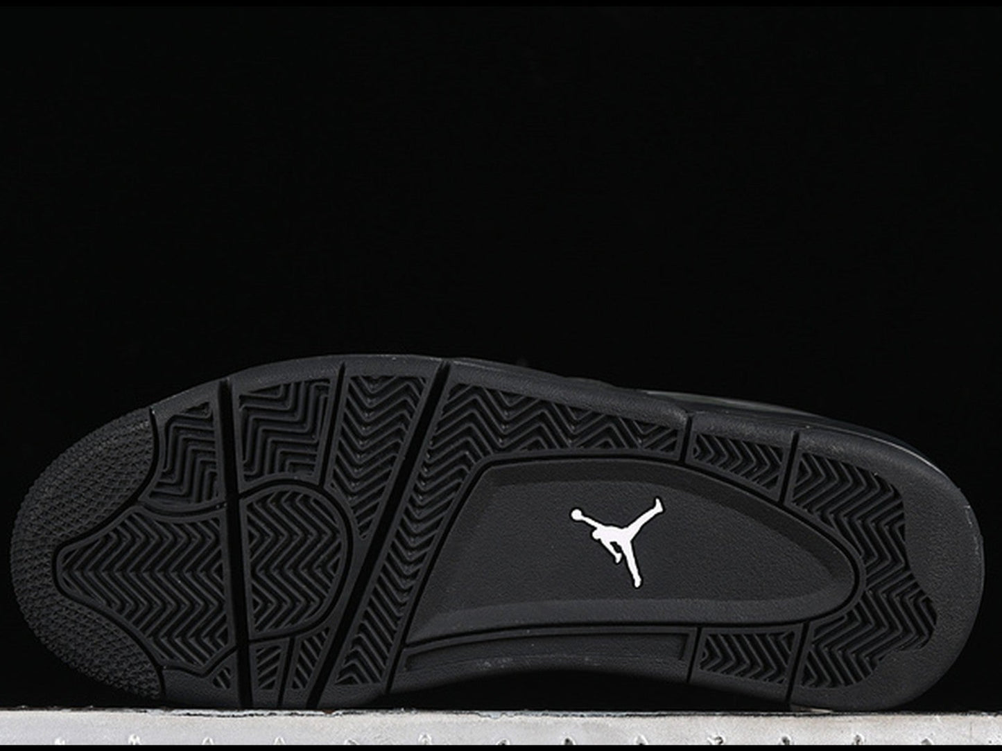 Jordan 4 RM Black Cat