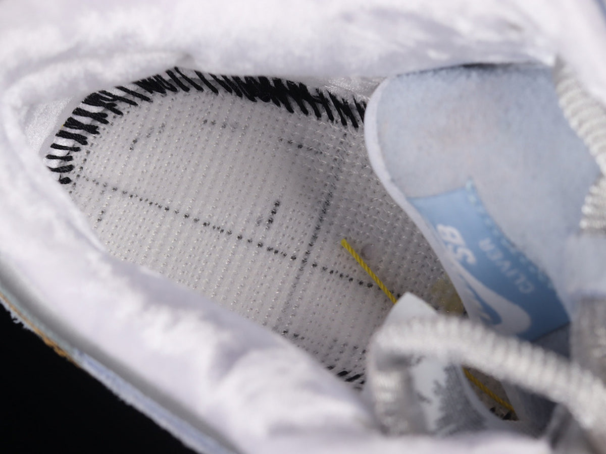 Sean Cliver x Nike SB Dunk Low "Holiday Special"