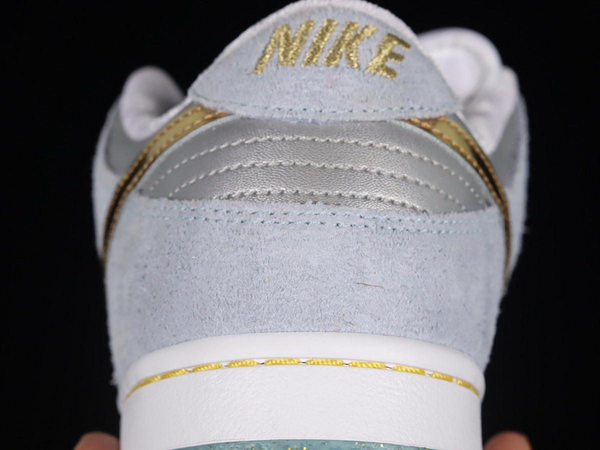 Sean Cliver x Nike SB Dunk Low "Holiday Special"
