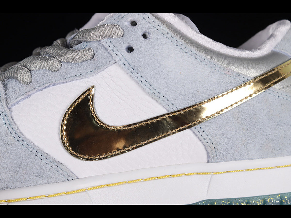 Sean Cliver x Nike SB Dunk Low "Holiday Special"