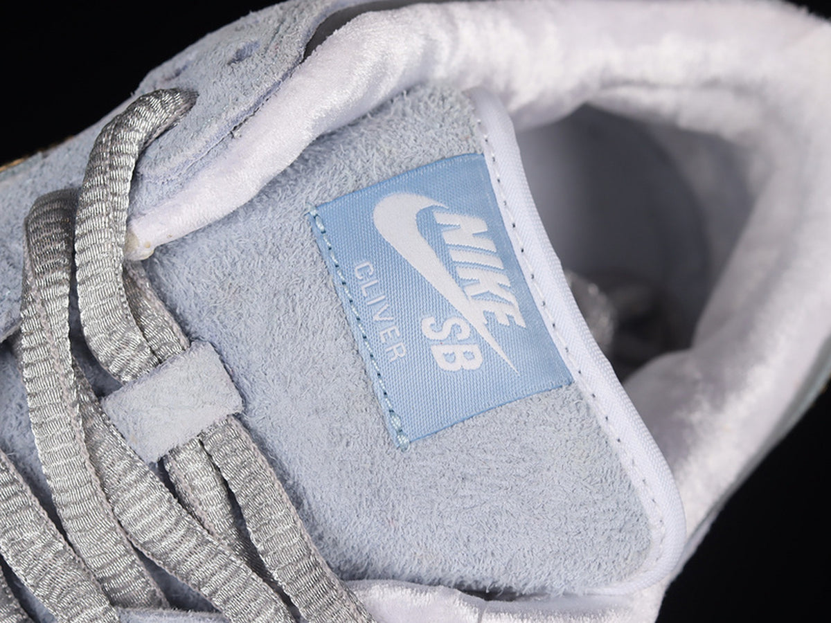 Sean Cliver x Nike SB Dunk Low "Holiday Special"
