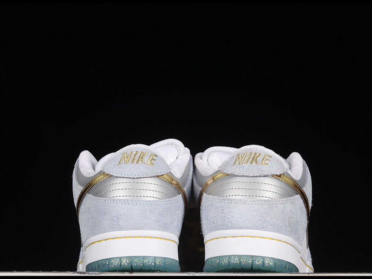 Sean Cliver x Nike SB Dunk Low "Holiday Special"
