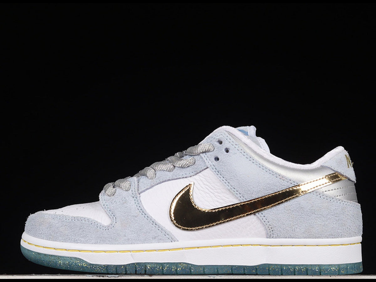 Sean Cliver x Nike SB Dunk Low "Holiday Special"